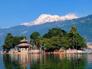 Phewa Lake Pokhara with boats and Himalayan mountain views